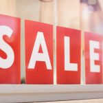 Sale Sign in Clothing Boutique